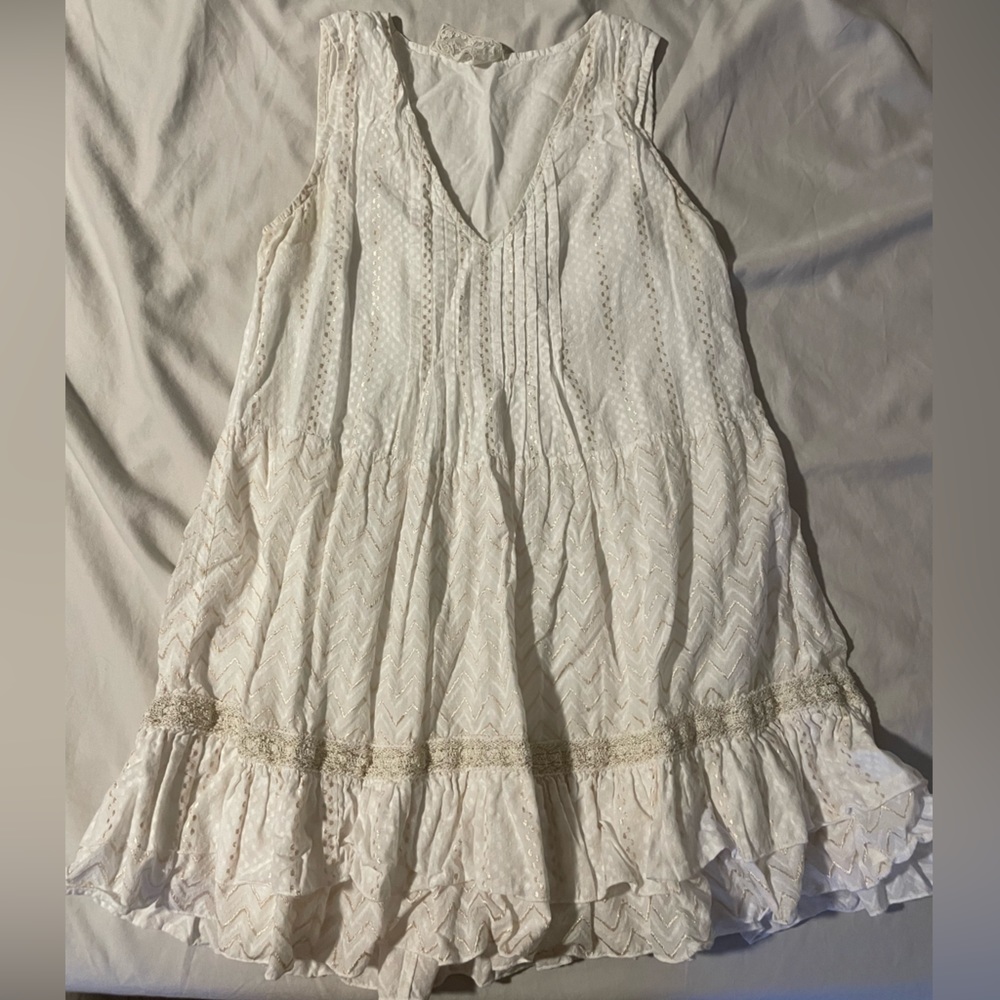 White and gold ruffled mini dress
